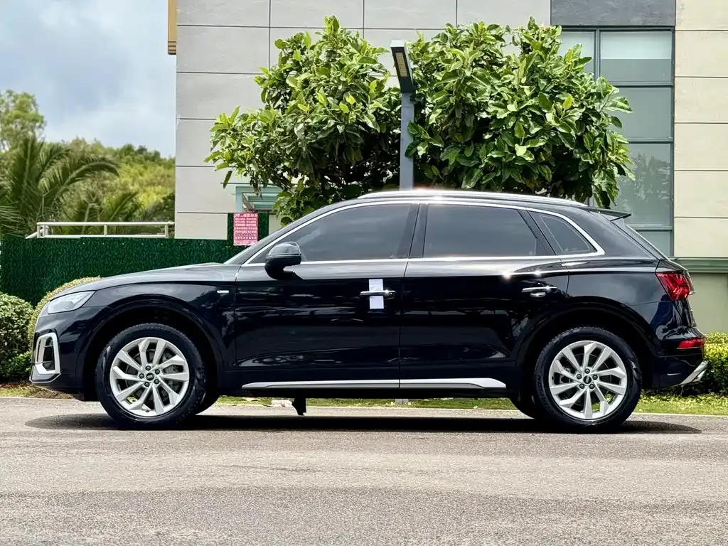 Audi Q5L — фото 6