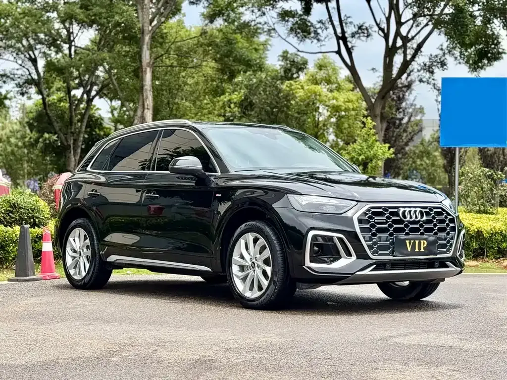 Audi Q5L — фото 5