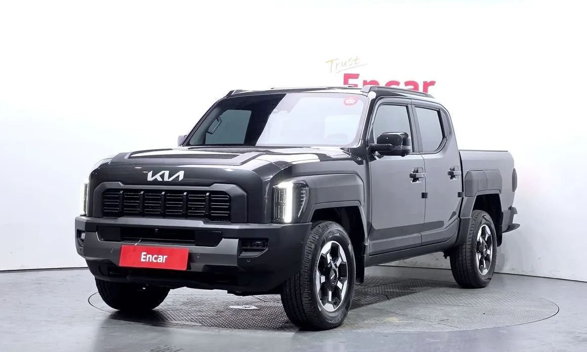 Kia Tasman — фото 1