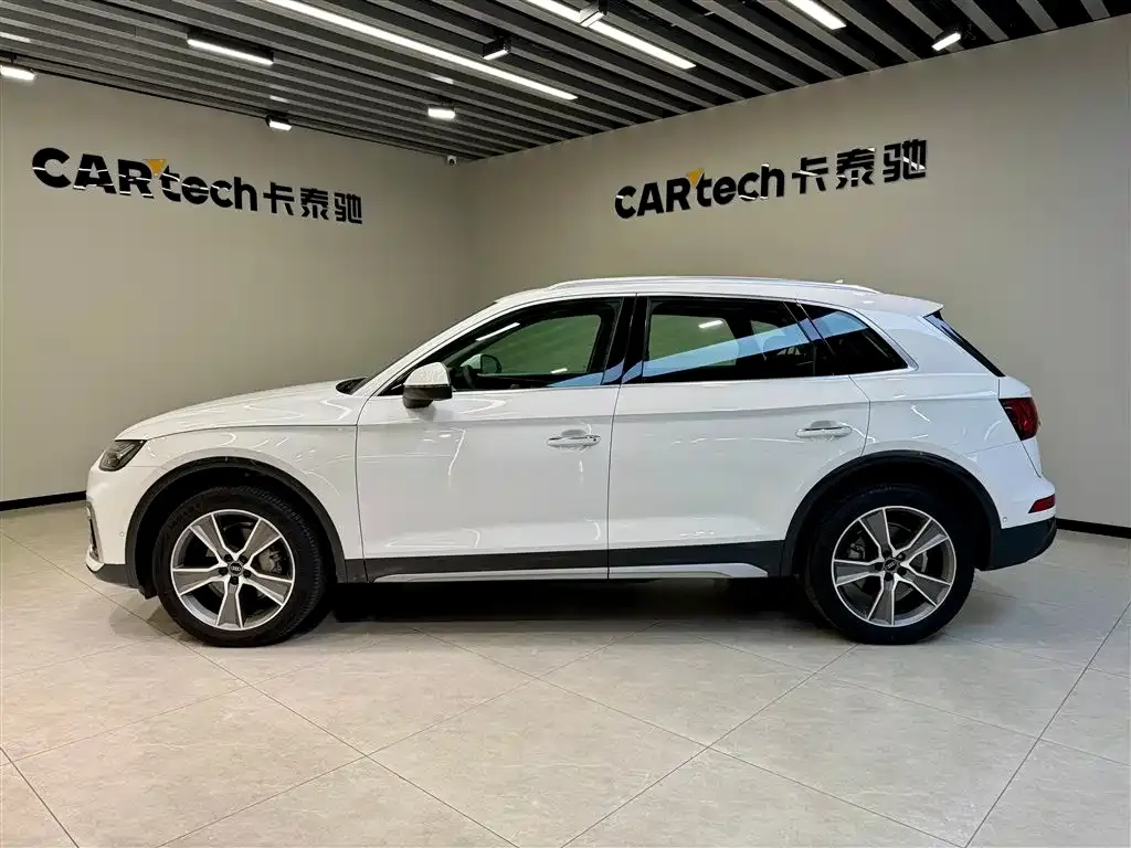 Audi Q5L — фото 8