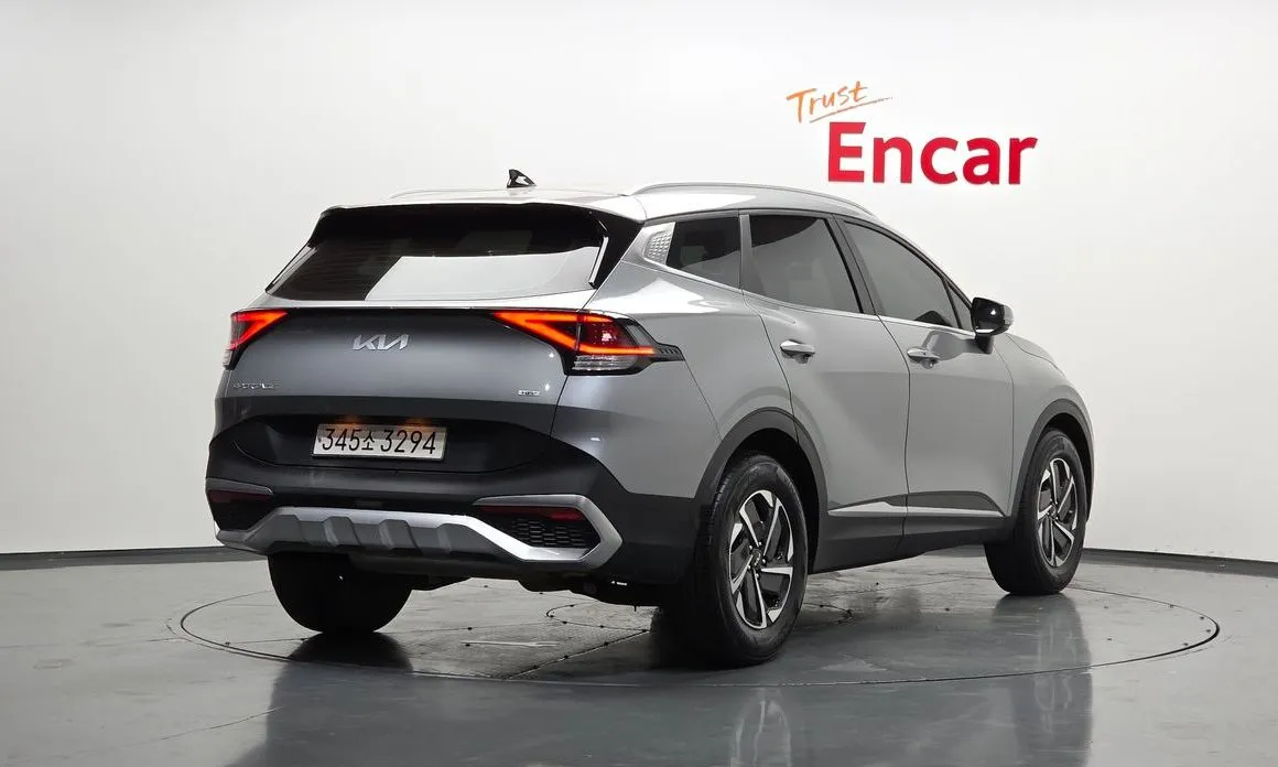 Kia Sportage — фото 10