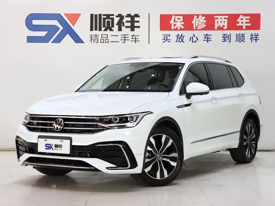 Volkswagen Tiguan L — фото 1