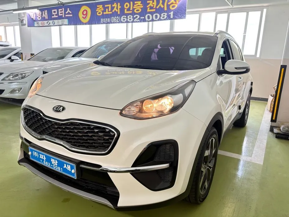 Kia Sportage — фото 1