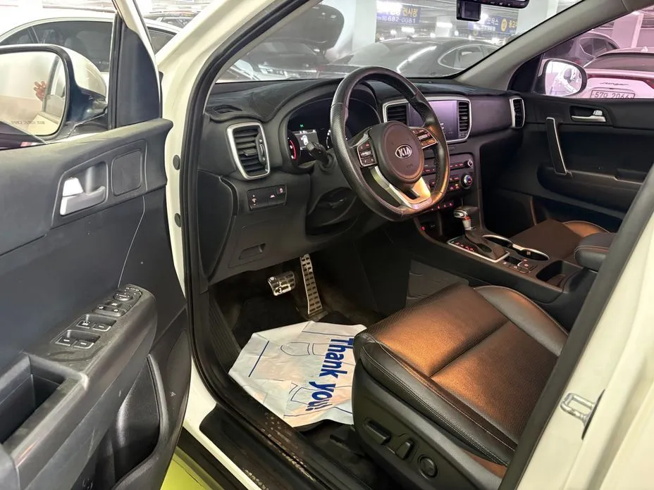 Kia Sportage — фото 9