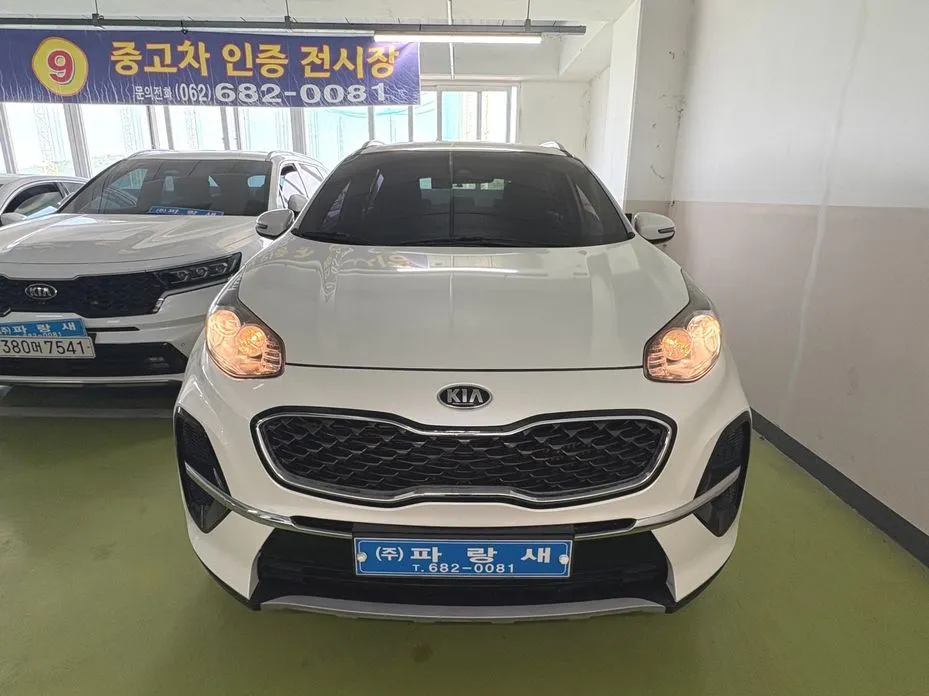 Kia Sportage — фото 8