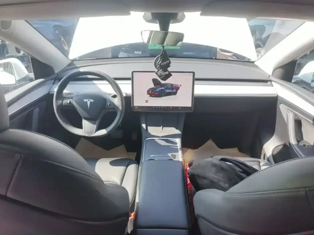 Tesla Model Y — фото 7
