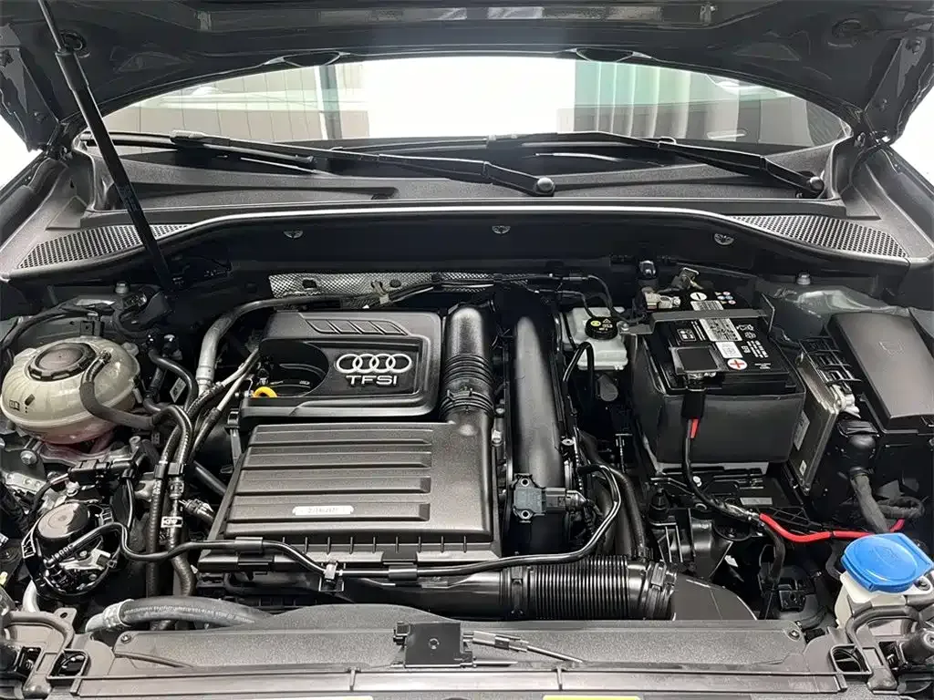 Audi Q2L — фото 10