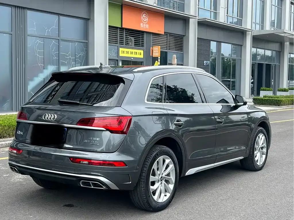 Audi Q5L — фото 5