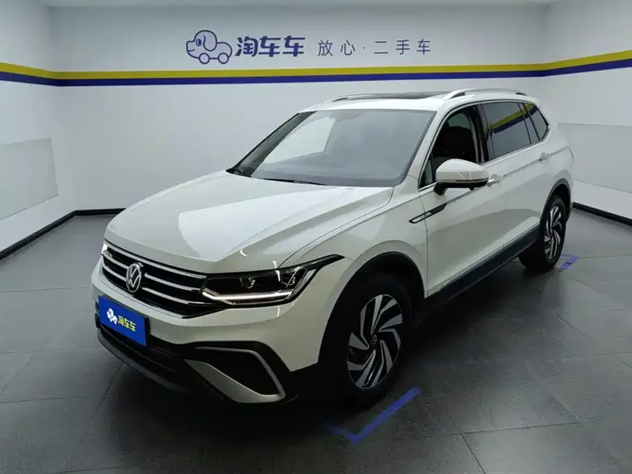 Volkswagen Tiguan L — фото 1