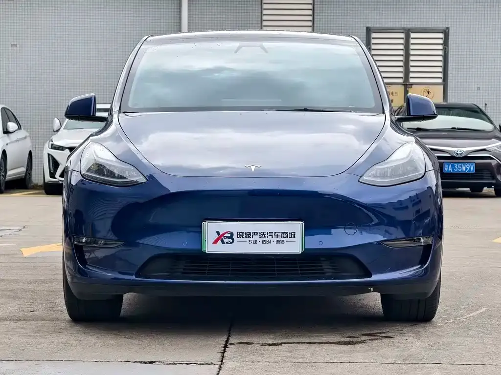 Tesla Model Y — фото 7