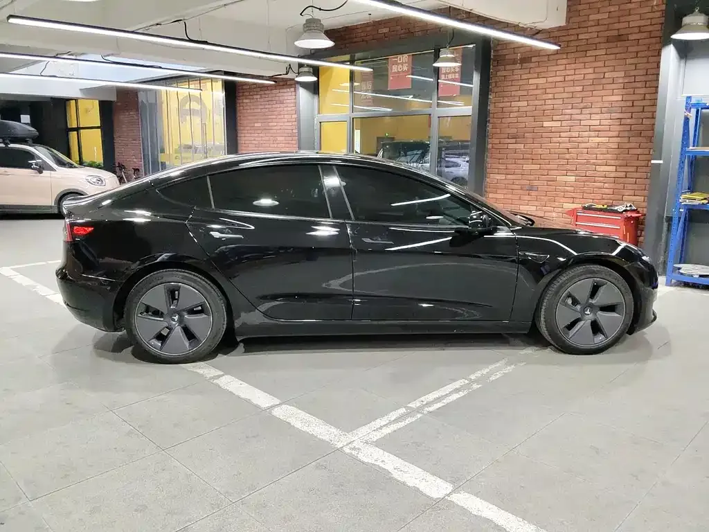 Tesla Model 3 — фото 7