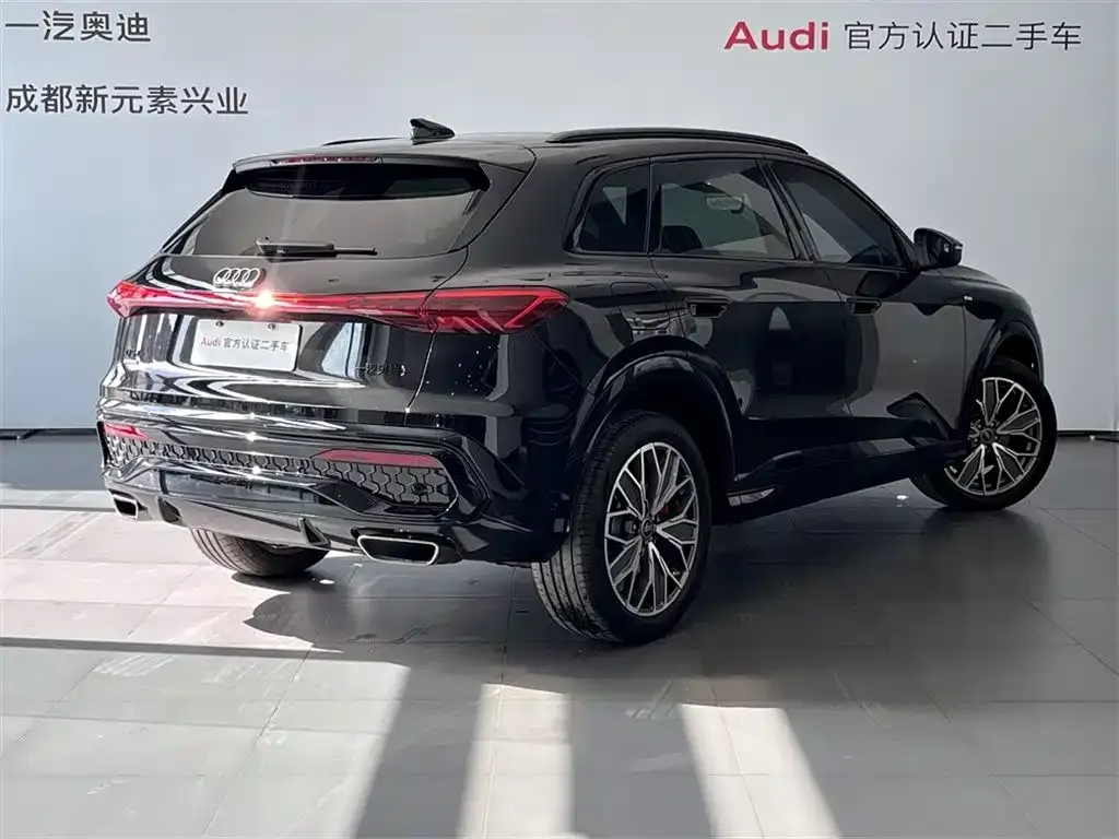 Audi Q5L — фото 5
