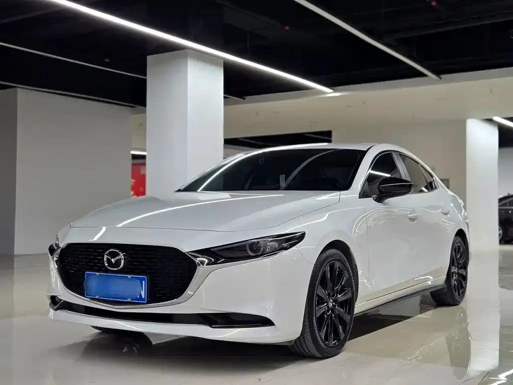 Mazda 3 Axela — фото 1