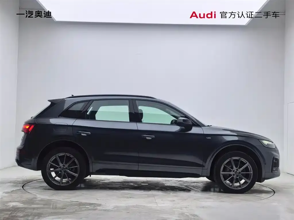 Audi Q5L — фото 10