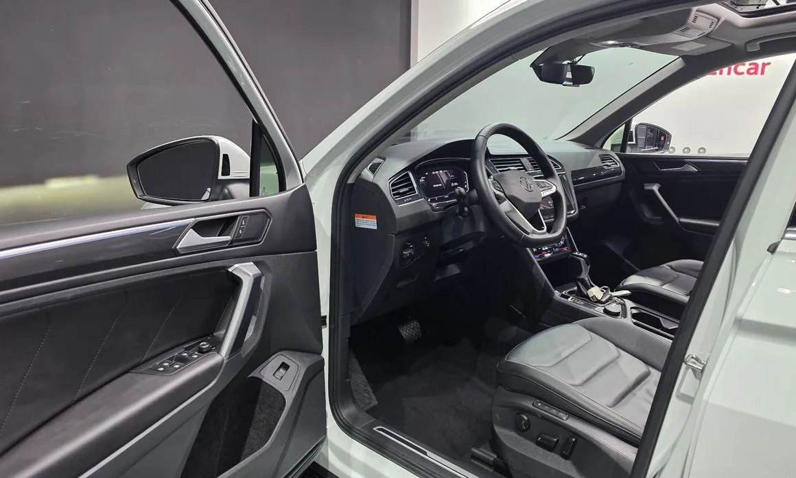 Volkswagen Tiguan — фото 7