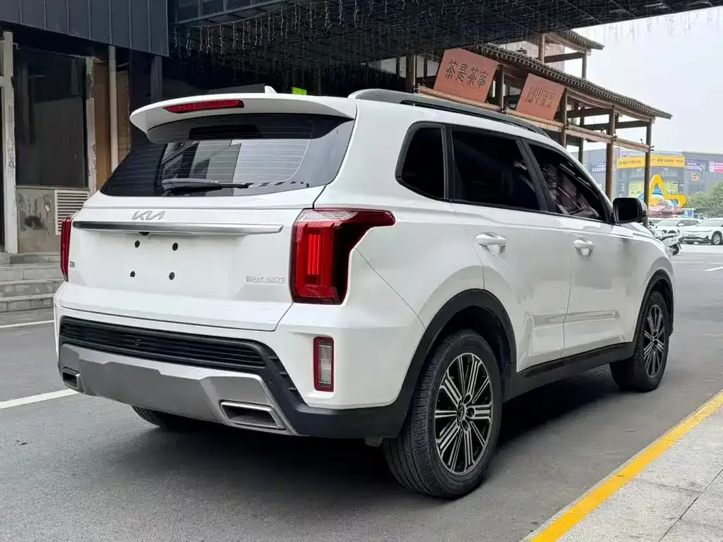 Kia Sportage — фото 10