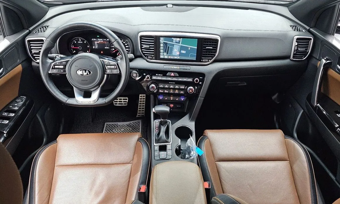 Kia Sportage — фото 9