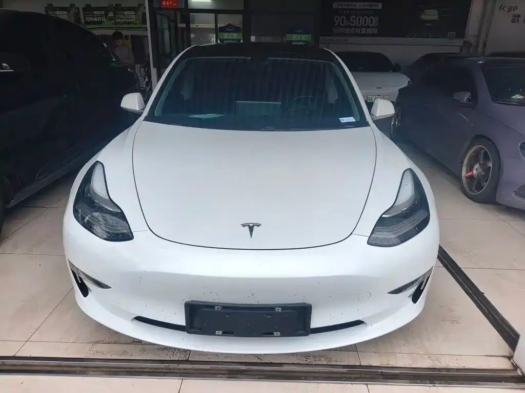 Tesla Model 3 — фото 5