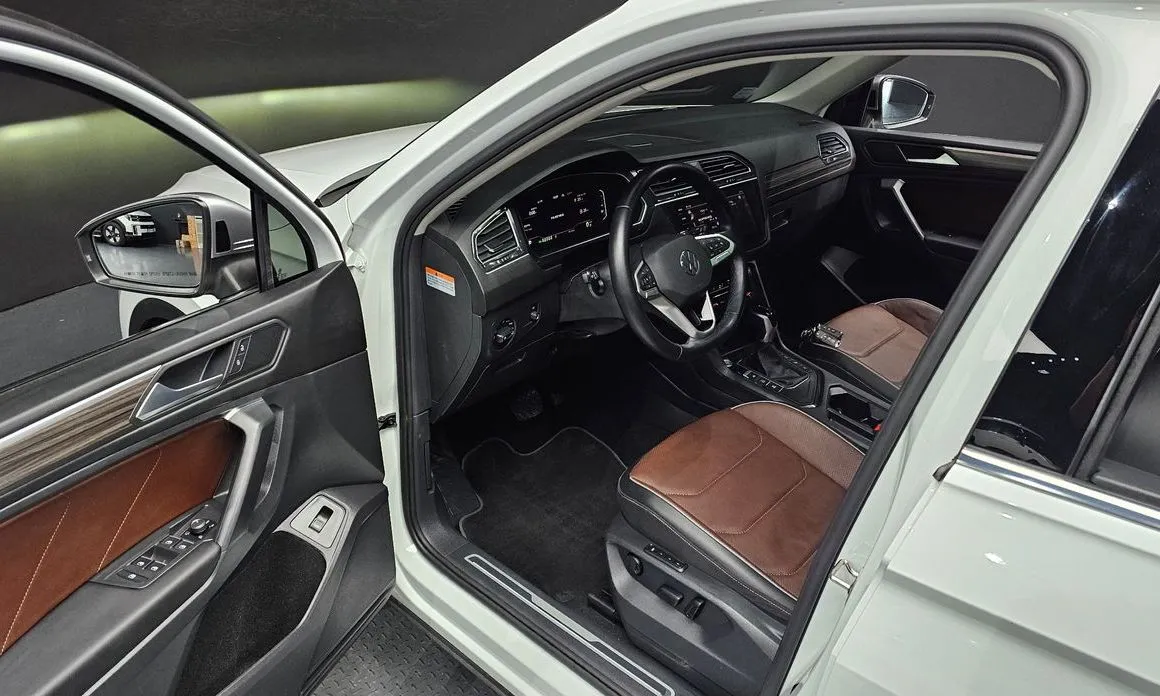 Volkswagen Tiguan — фото 10