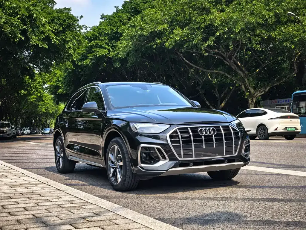 Audi Q5L — фото 10