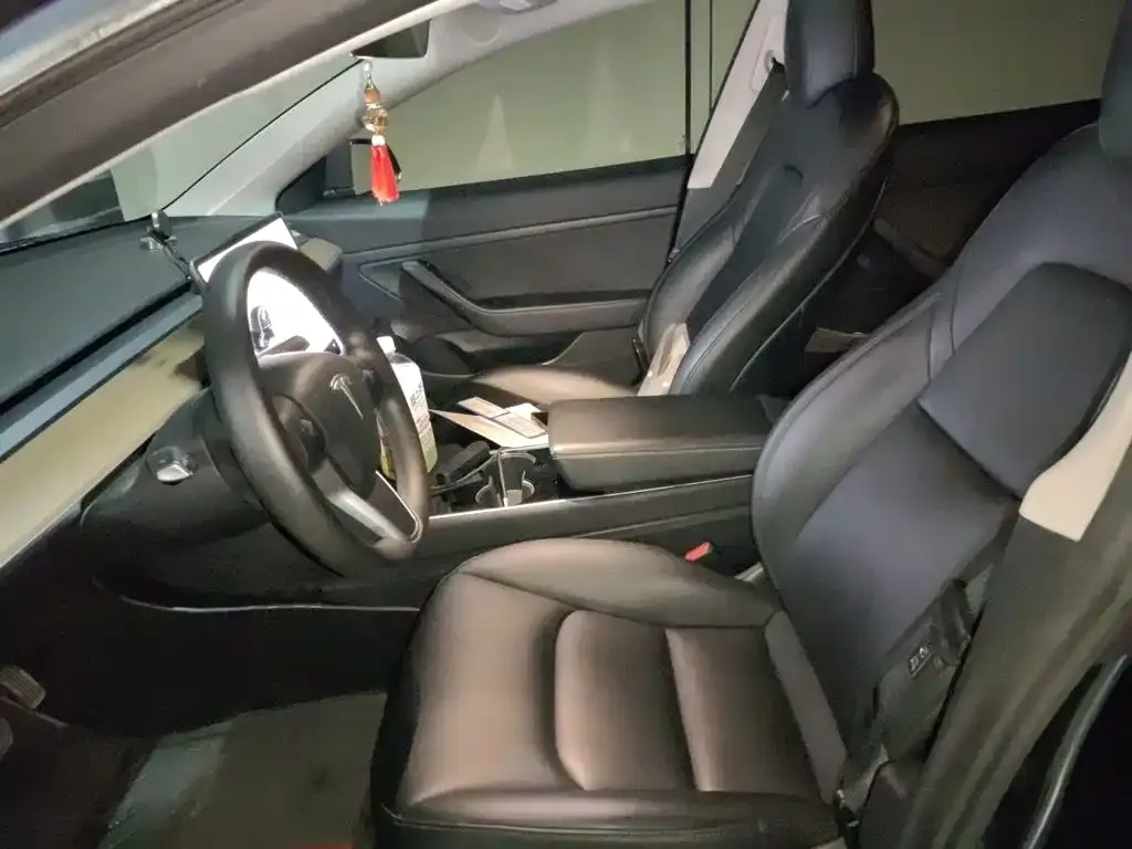 Tesla Model 3 — фото 10