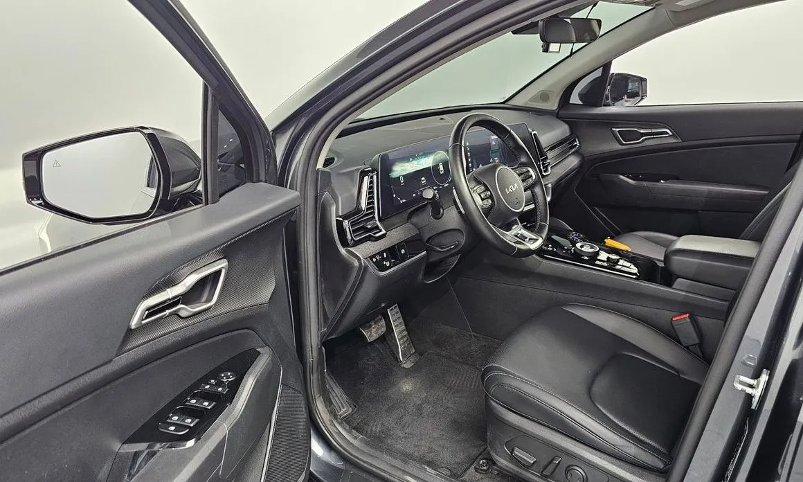 Kia Sportage — фото 9