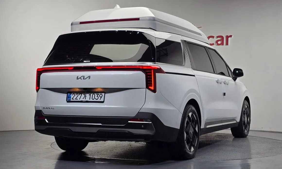 Kia Carnival — фото 10