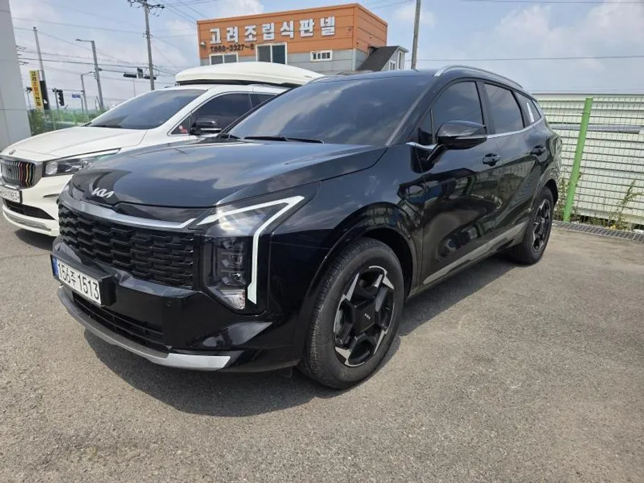 Kia Sportage — фото 10