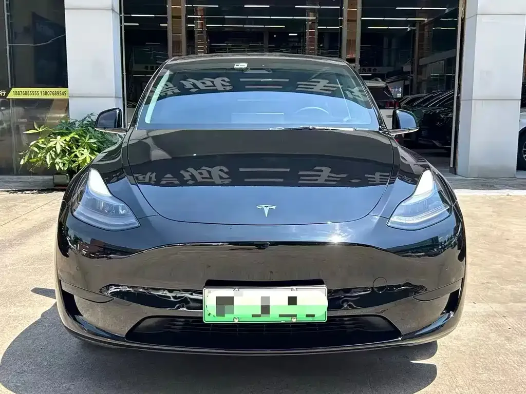 Tesla Model Y — фото 9