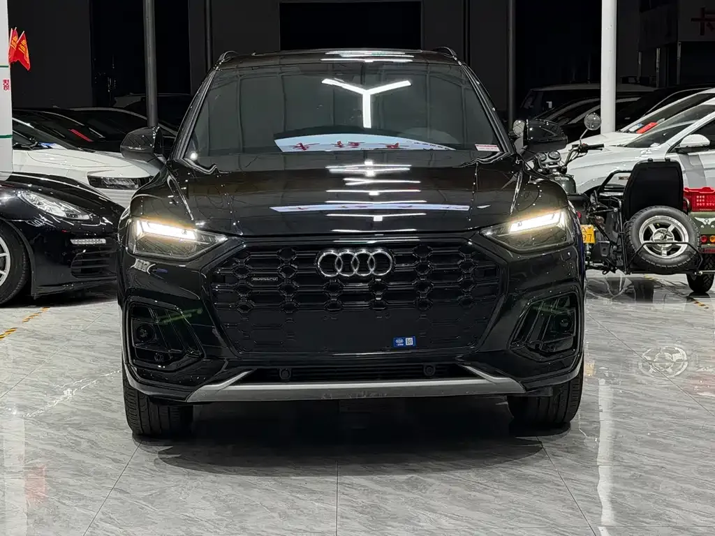 Audi Q5L — фото 10