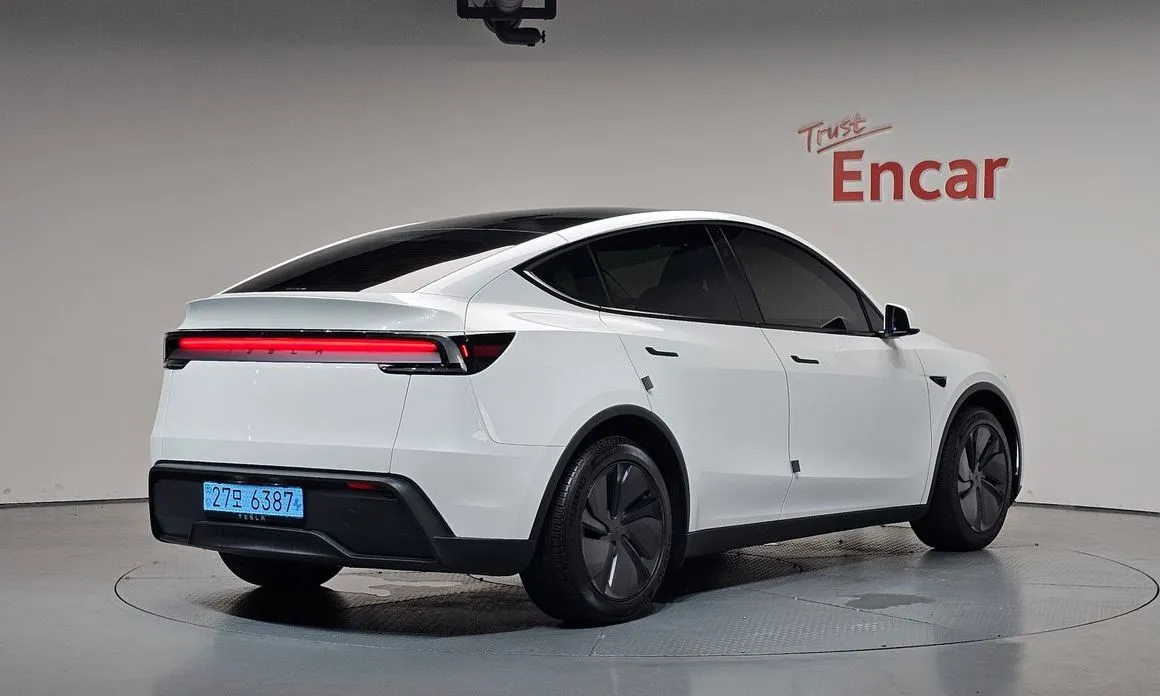 Tesla Model Y — фото 3