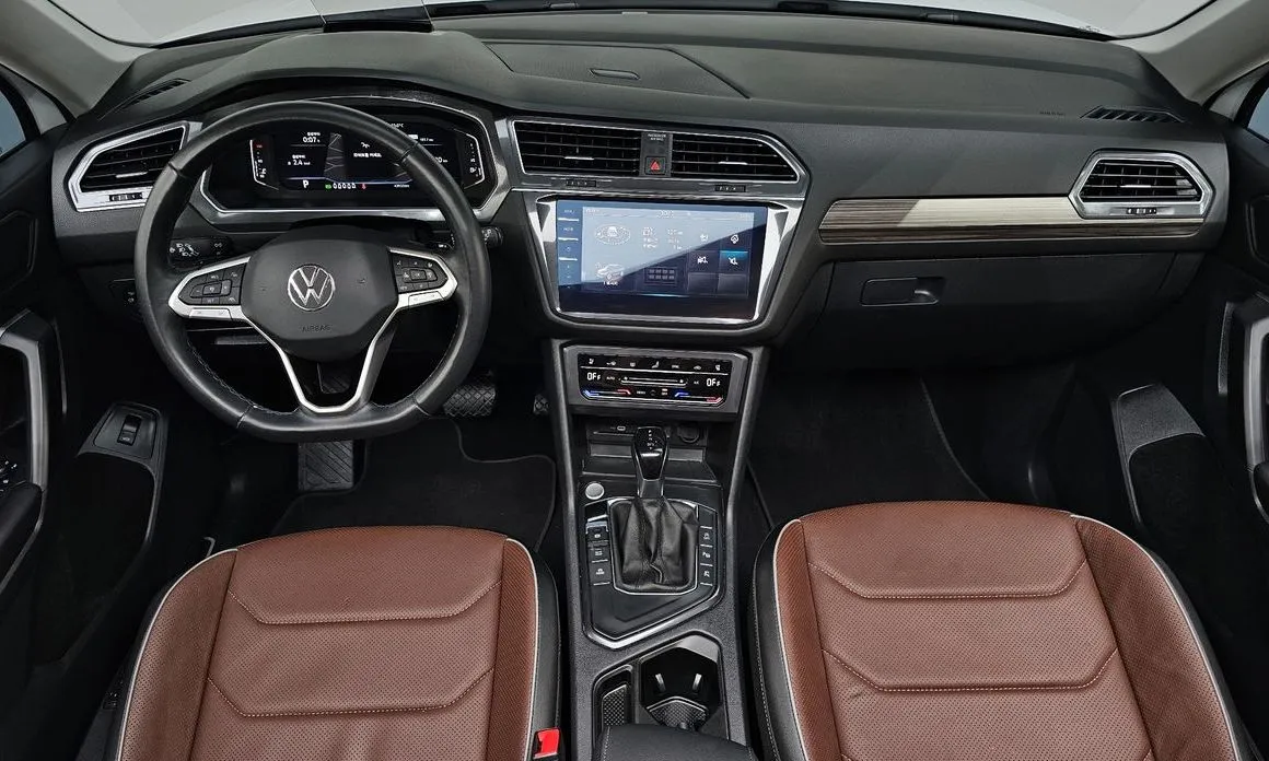 Volkswagen Tiguan — фото 9
