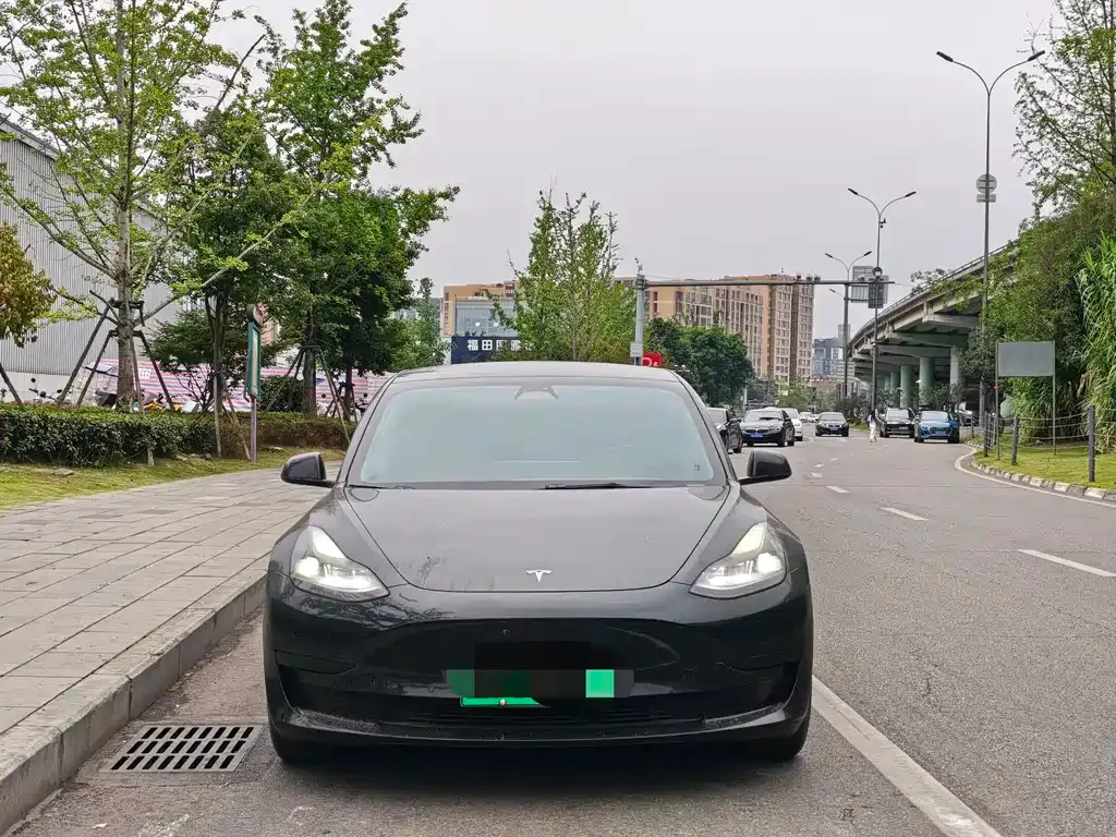 Tesla Model 3 — фото 7