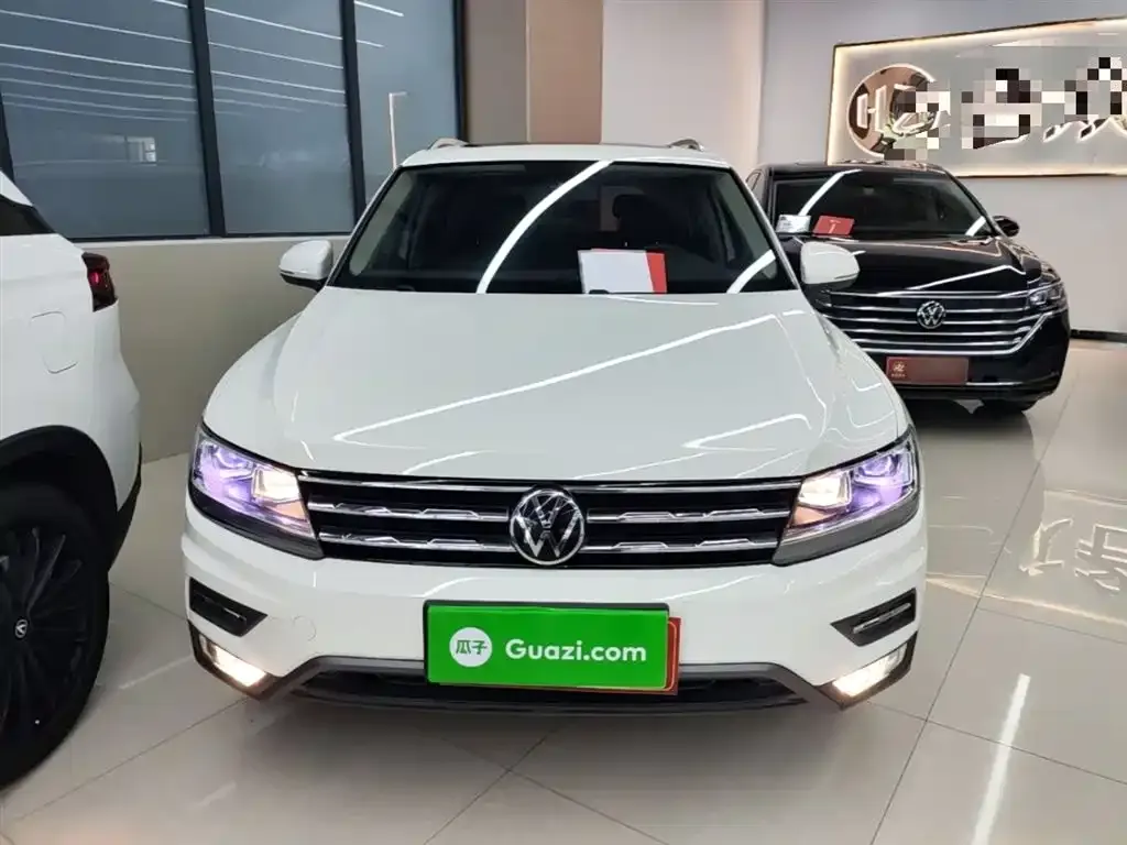 Volkswagen Tiguan L — фото 8