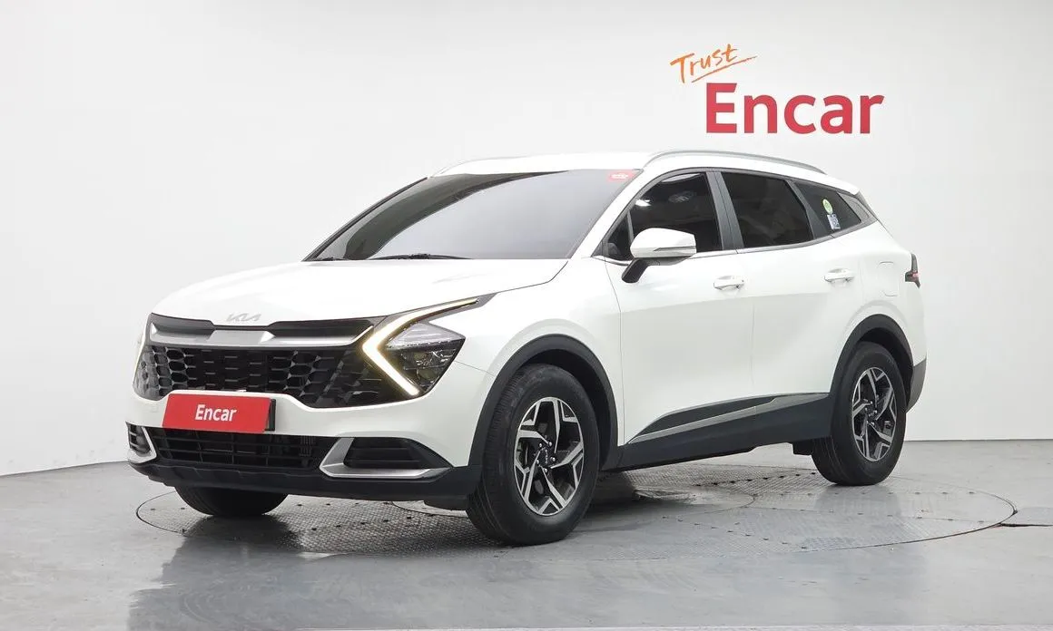 Kia Sportage — фото 1