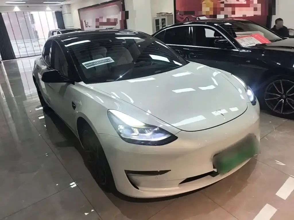 Tesla Model 3 — фото 10