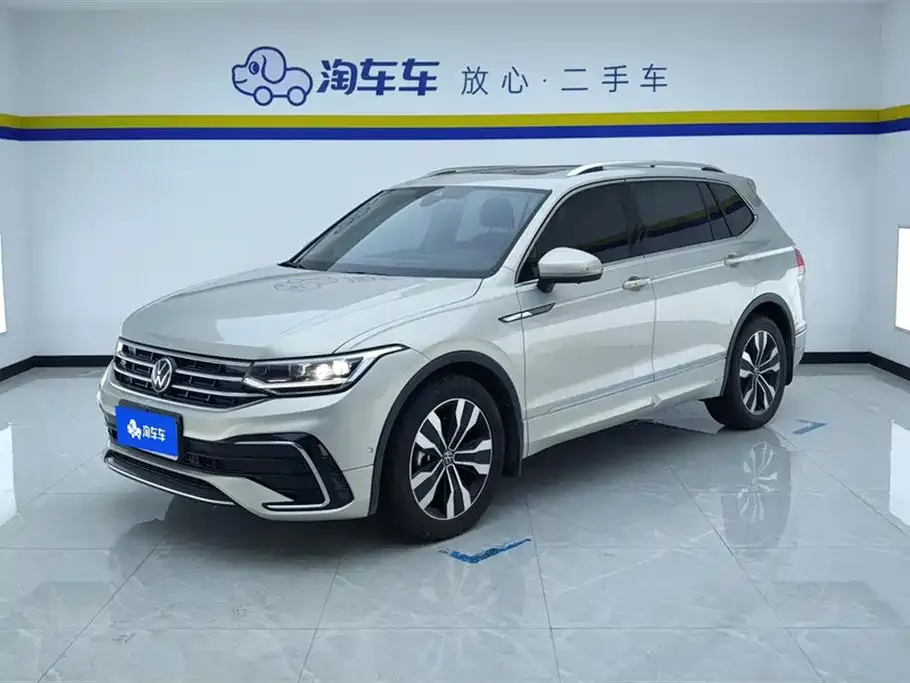 Volkswagen Tiguan L — фото 1