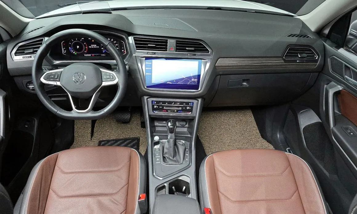 Volkswagen Tiguan — фото 10