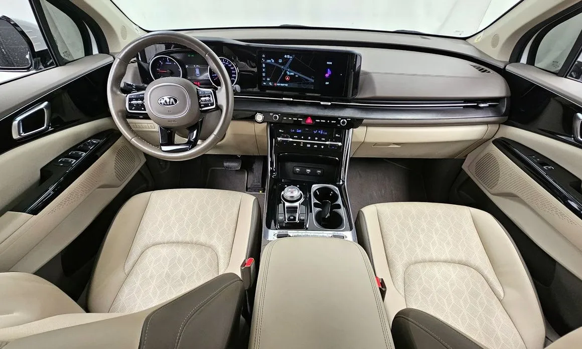 Kia Carnival — фото 10