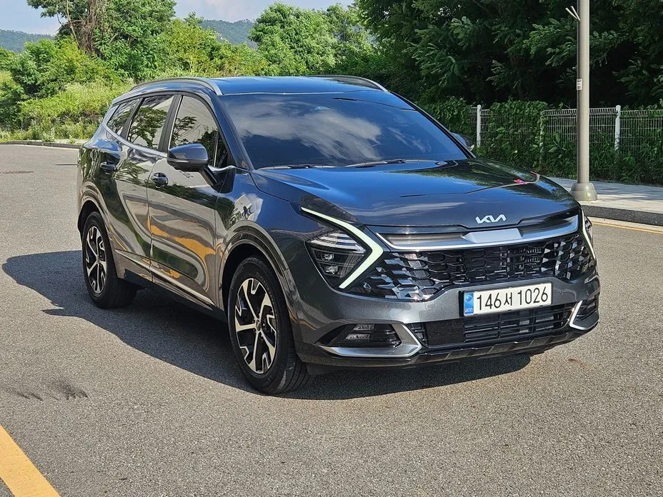 Kia Sportage — фото 10