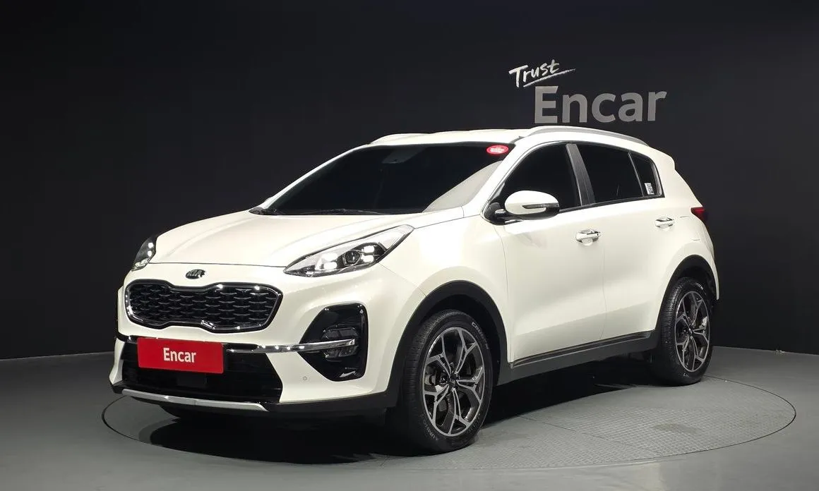 Kia Sportage — фото 1