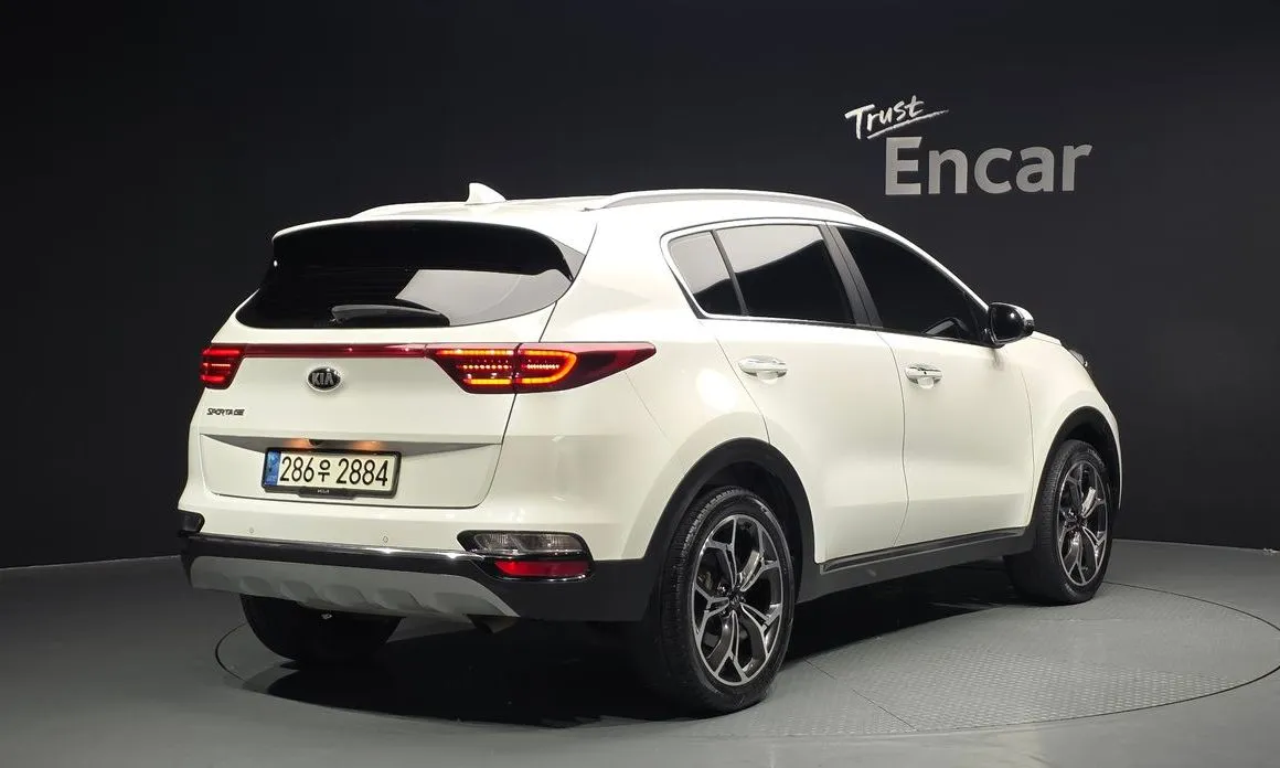 Kia Sportage — фото 10