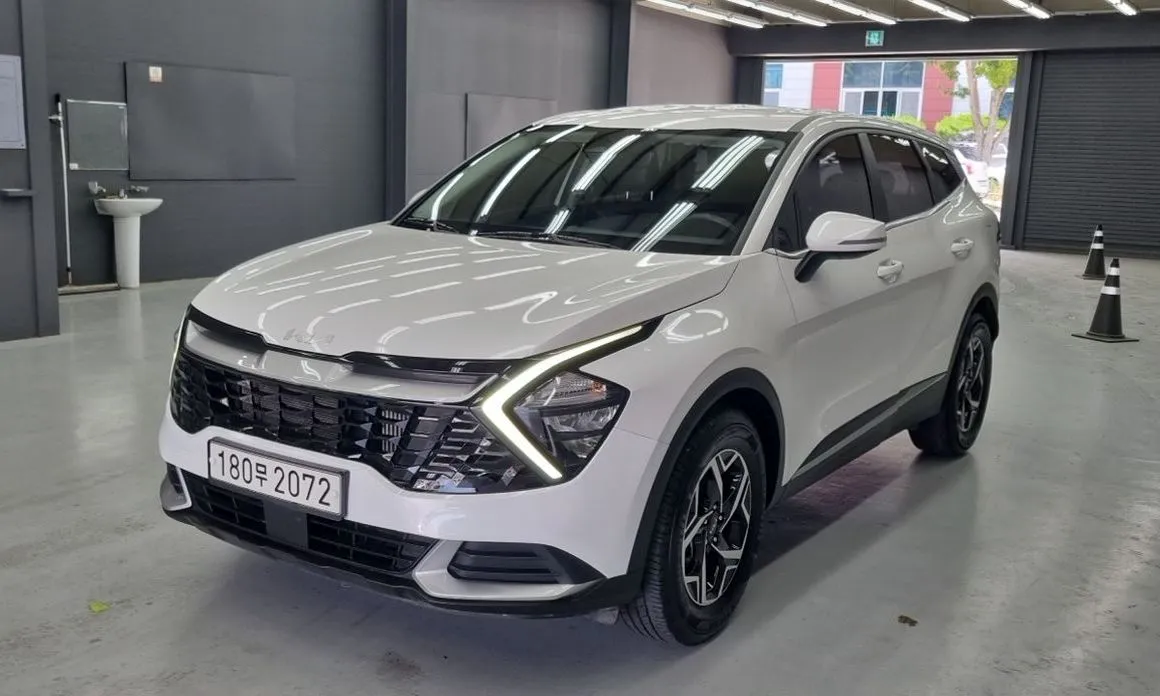 Kia Sportage — фото 1
