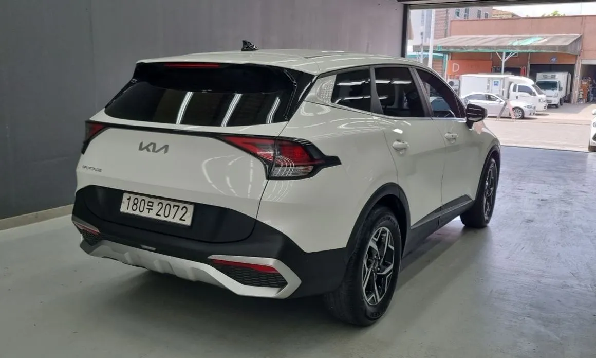 Kia Sportage — фото 8