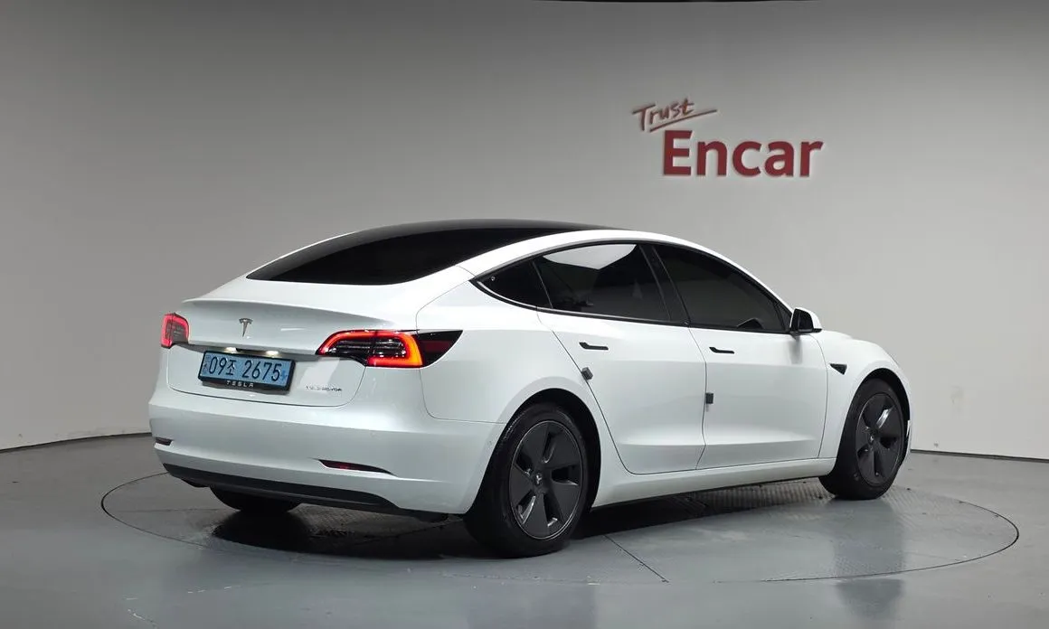 Tesla Model 3 — фото 3