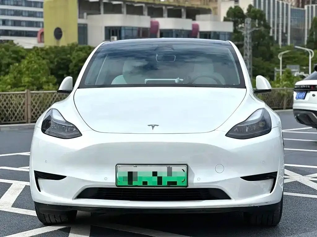 Tesla Model Y — фото 7