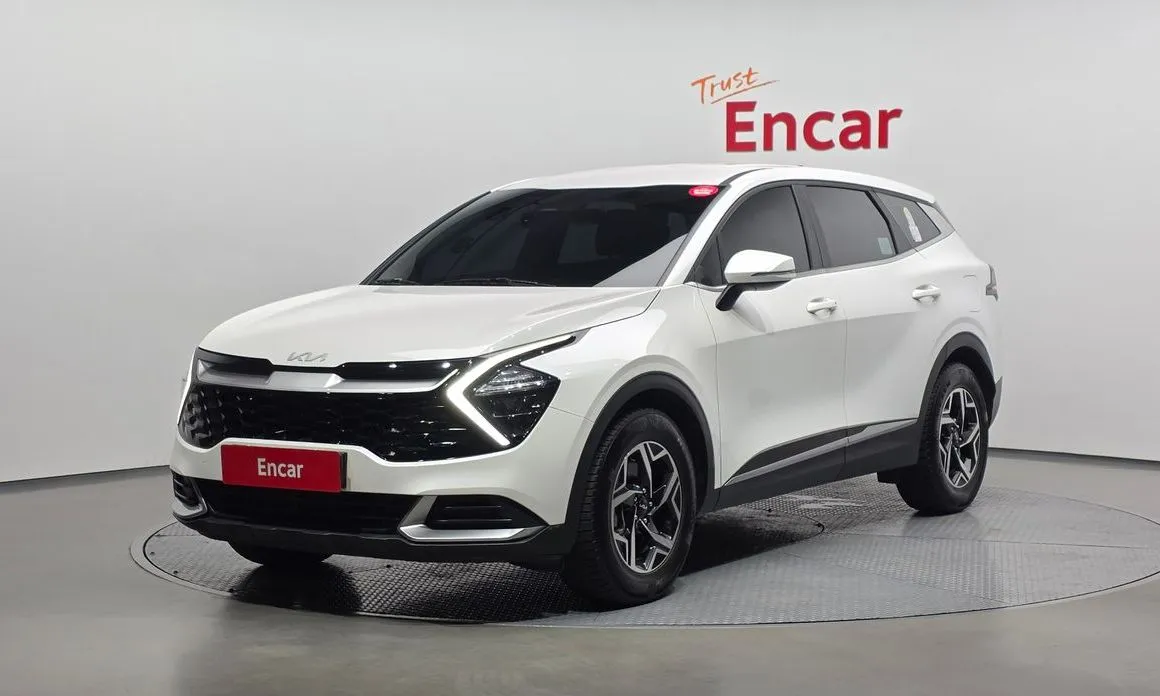 Kia Sportage — фото 1