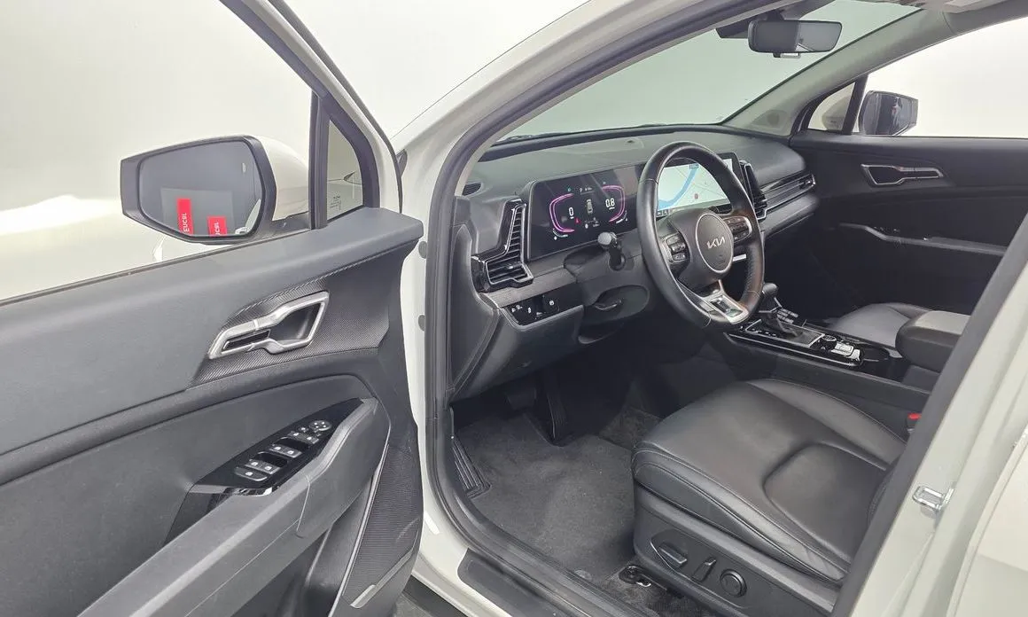 Kia Sportage — фото 7
