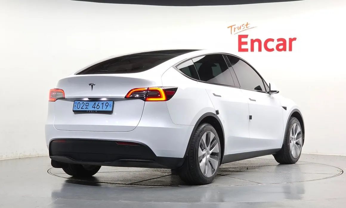 Tesla Model Y — фото 8