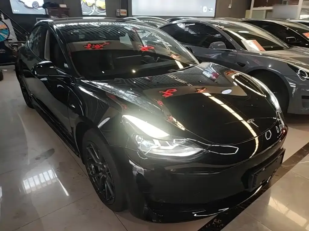 Tesla Model 3 — фото 10
